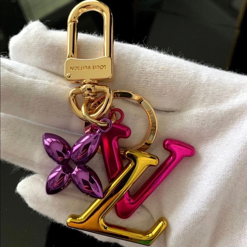 Louis Vuitton New wave bag charm key holder.